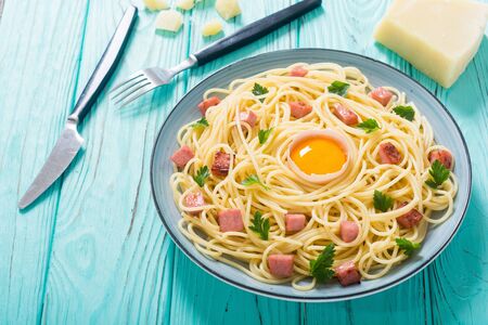 Italian pasta carbonara with sausage and egg . Spaghetti food backgroundの写真素材