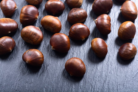 Autumn food chestnut. Organic fresh nuts backgroundの写真素材