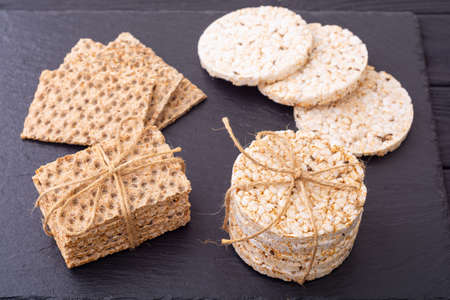 Crispbread and rice cakes. Healthy diet snack, food background.の写真素材