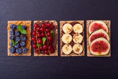 Rice cake with banana blueberry redcurrant and figs.の写真素材