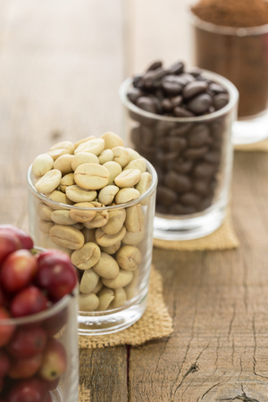 close-up coffee bean on wood backgroundの写真素材
