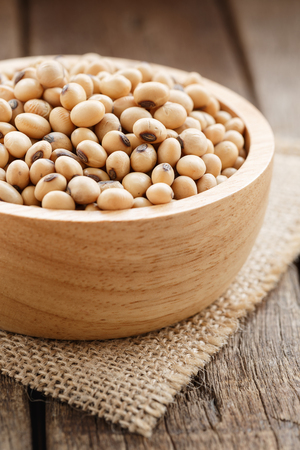soybean cereal organic in bowl on wood background vertical viewの写真素材