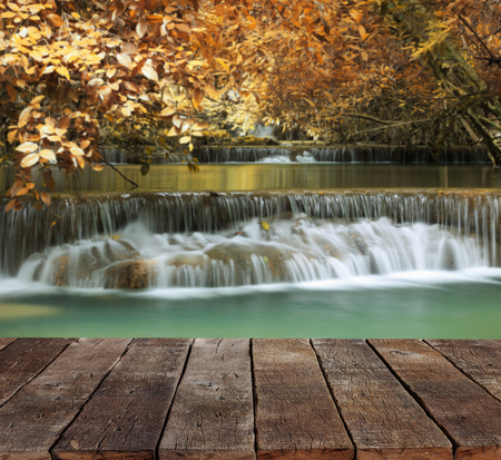 wood floor and beauty waterfall backgroundの写真素材