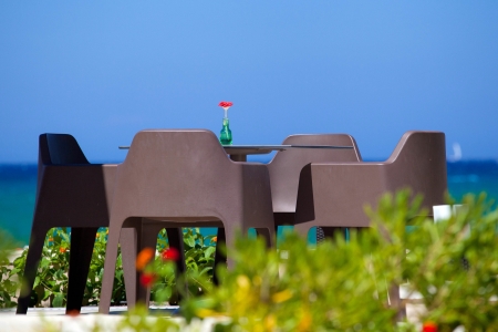 Romantic Table on the beach, with a beautiful sea viewの写真素材
