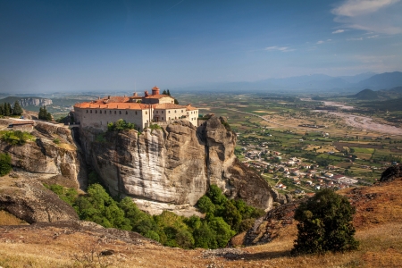 Impressive monastery construction on high hill at Meteora - Greece