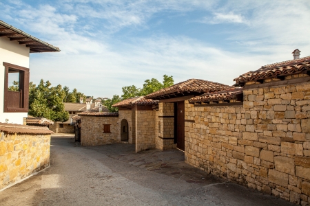 A stone wall and an old house from Arbanasi, Bulgaria の写真素材