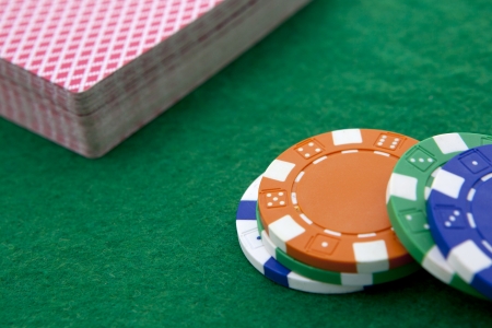 chips and deck of cards close-upの写真素材