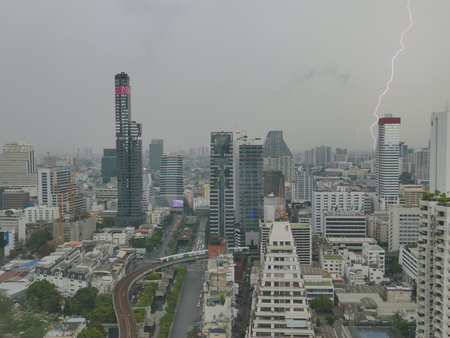 Bangkok,Thailand - April  29: lightning phenomena as south westerly wind hit north easterly wind hit each other approaching bangkok downtown business area on the April 29,2017 in Bangkok,Thailandのeditorial素材
