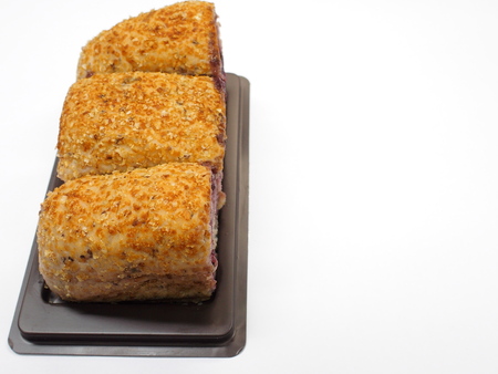 brown rice organic roll bread filled with dark cherryの写真素材