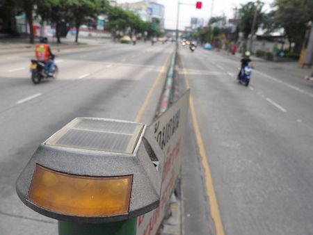 led signal light beside law enforcement sign only crossing at zebra crossing and minimum fine is five hundred bahtの写真素材