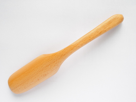 back side of beech wood tea spoon on white backgroundの写真素材