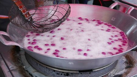 fried japanese casava ball in vegetable palm oilの写真素材