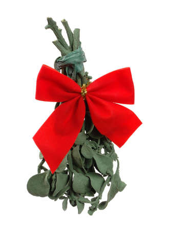 Real mistletoe with gold and red ribbon attachedの写真素材