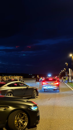 police cars in the street at nightの写真素材