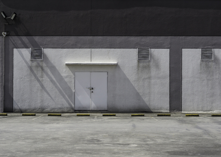 Wall with shadow and door