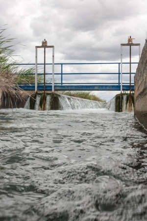 Floodgate area at huge irrigation canal of High Guadiana or Vegas Altas, Extremadura, Spain