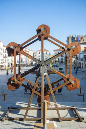 Caceres, Spain - Nov 19th, 2021: Wooden human powered ferris wheel. Caceres Medieval Festival, Extremadura, Spainのeditorial素材