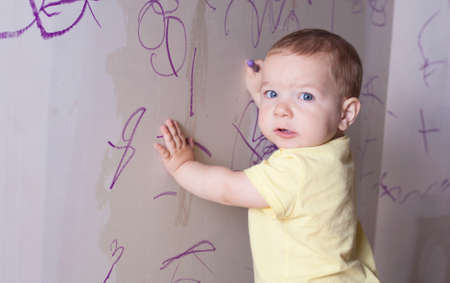 Gael drawing on the plasterboard of Bravo Murilloの写真素材