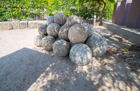 Merida, Spain - August 25th, 2018: Alcazaba of Merida, arabic citadel complex. 15th Century stone projectiles. Extremadura, Spainのeditorial素材
