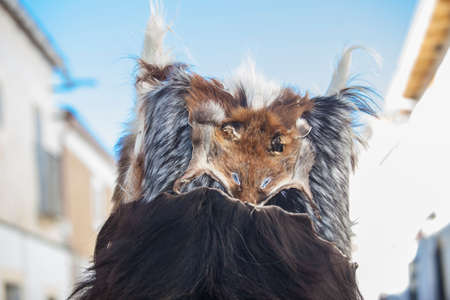 Caceres, Spain - Jan 20th, 2022: Grotesque mask from Carantonas Festival of Acehuche, Caceres, Spain. Festival of National Tourist Interestのeditorial素材