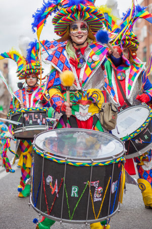 Badajoz, Spain - February 28, 2017: Drummer woman playing at Carnival parade of Badajoz. This is one of the best carnivals in Spain, especially highlighting massive participation of peopleのeditorial素材