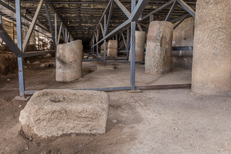 Stones with holes to fit in the rigging system at Roman theater of Medellin, Spainのeditorial素材
