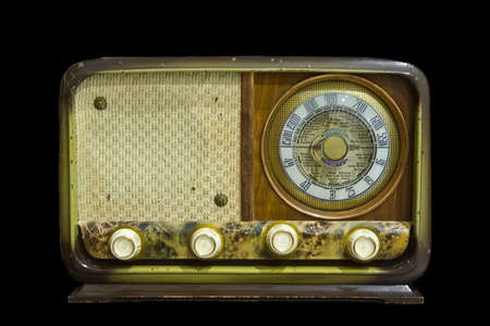 Old vintage radio from 1950 isolated over black background, Badajoz, Spainのeditorial素材