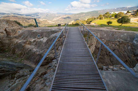 Castle of Jimena de la Frontera, Cadiz, Spain. Christian Alcazar moat footbridgeの写真素材