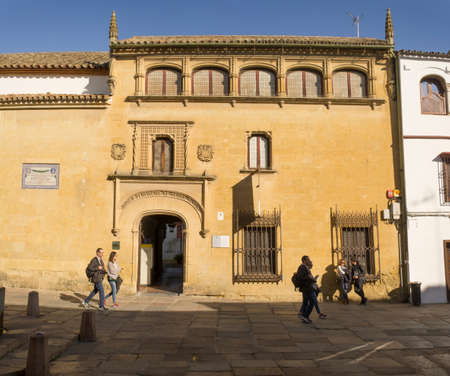 Cordoba, Spain - Sept 8th, 2018: Visitors outdoors the Fine Art Museum of Cordoba, Cordoba, Spain. He has audio tour deviceのeditorial素材