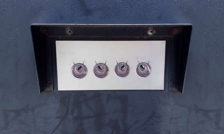 4 key holes protected with metal roof. Automatic parking barrier device