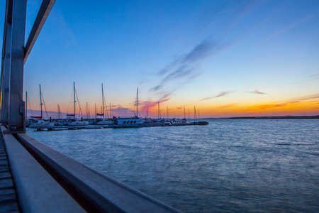 El Rompido marina footbridge at sunset, Cartaya, Huelva, Spainのeditorial素材