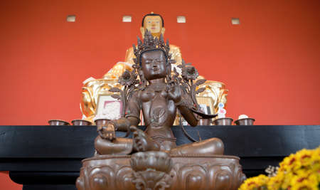 Buddha images, Close up face of gold buddha, Malaga, Spain