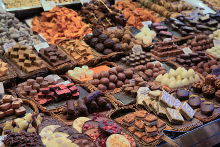 Loads of chocolate sweets on the Boqueria market in Barcelona, Spainの写真素材