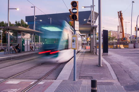 Barcelona, Spain - July 27, 2016: Barcelona tram in motion. The tram is going through the Diagonal avenueのeditorial素材