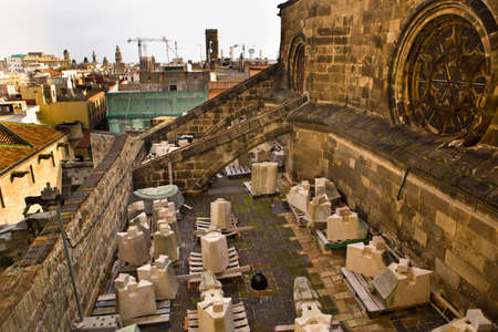 Church in restoration with stone pieces over the roof at Holy Cross and Saint Eulalia, Barcelona, Spainのeditorial素材