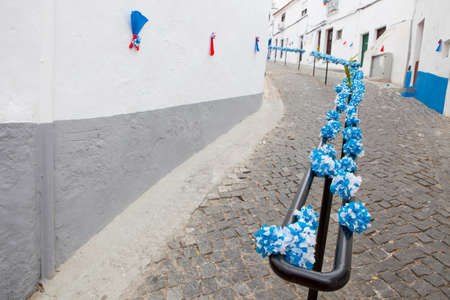 Flower festival in Campo Maior with paper flowers decorated streets, Portugal