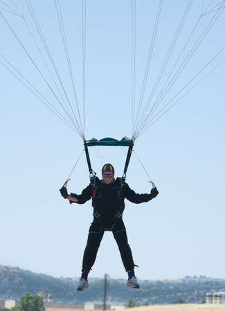 CORDOBA, SPAIN, - JUN 10, 2013: Unidentified skydiver performing skydiving with blue sky in the...