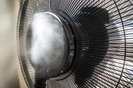 Water Vapor Mist Fan splashing vaporized water. closeup