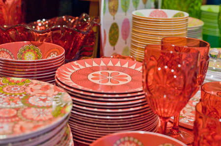 Beautiful colorful Ceramic and glass tableware and giftware on a market stallの写真素材
