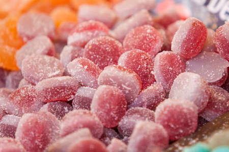 Berries of the forest sweet jellies at street market stall
