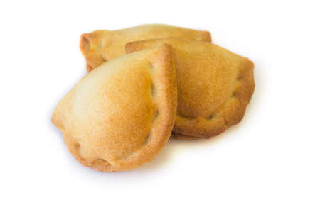 Typical spanish empanadillas or tuna small turnover. Isolated over white background