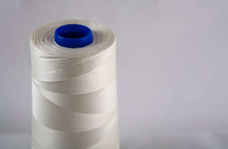 Cotton thread on spools isolated on white background