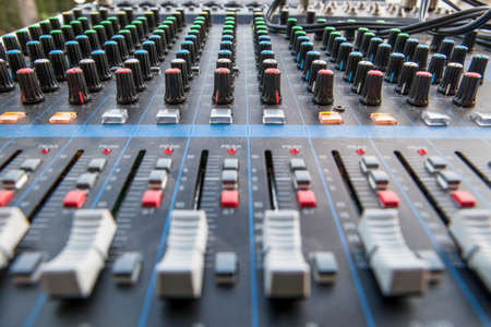 Sound board closeup for outside live performance. selective focus
