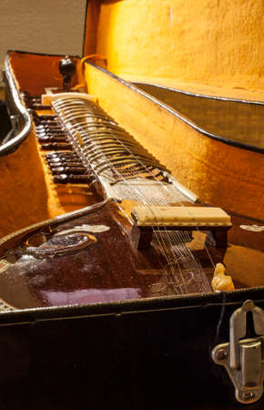 Instrument case with Sitar, a string traditional Indian musical instrument. close up