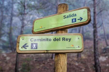 Ardales, Spain - Dec 6th,2016: Wooden pole with hiking tracks direction at Gorge of the Gaitanes and Caminito del Rey path, Malaga, Spainのeditorial素材