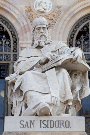 Madrid, Spain - March 6th, 2021: Isidore of Seville statue at National Library of Spain, Madrid. Medieval Spanish scholarのeditorial素材