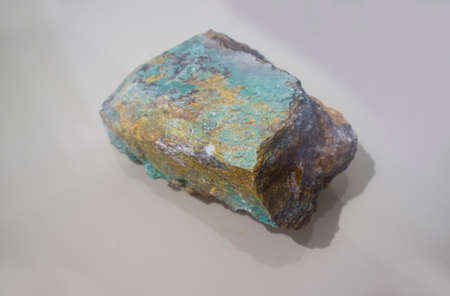 Piece of malachite rock. Selective focus. isolated
