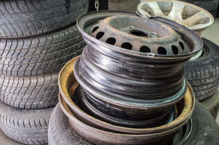 Used rims closeup. Piles of wheels waiting for repaired. closeupの写真素材