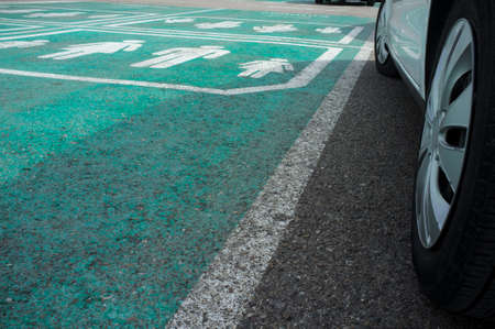 Floor sign that indicates priority parking for families. selective focusの写真素材