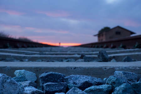 Railway tracks with abandoned rural station at dusk, Badajoz, Spainの写真素材